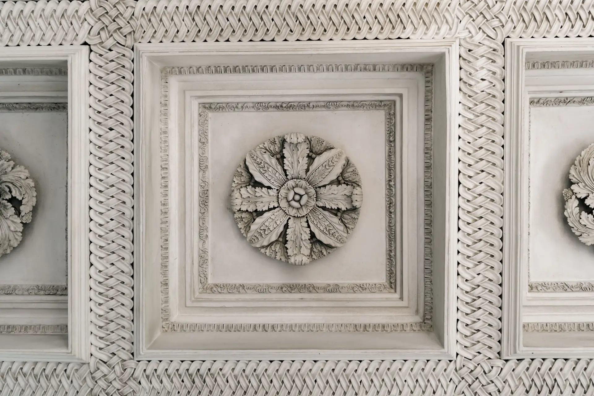 Ornate plaster restoration paired with contemporary spatial balance in Covent Garden