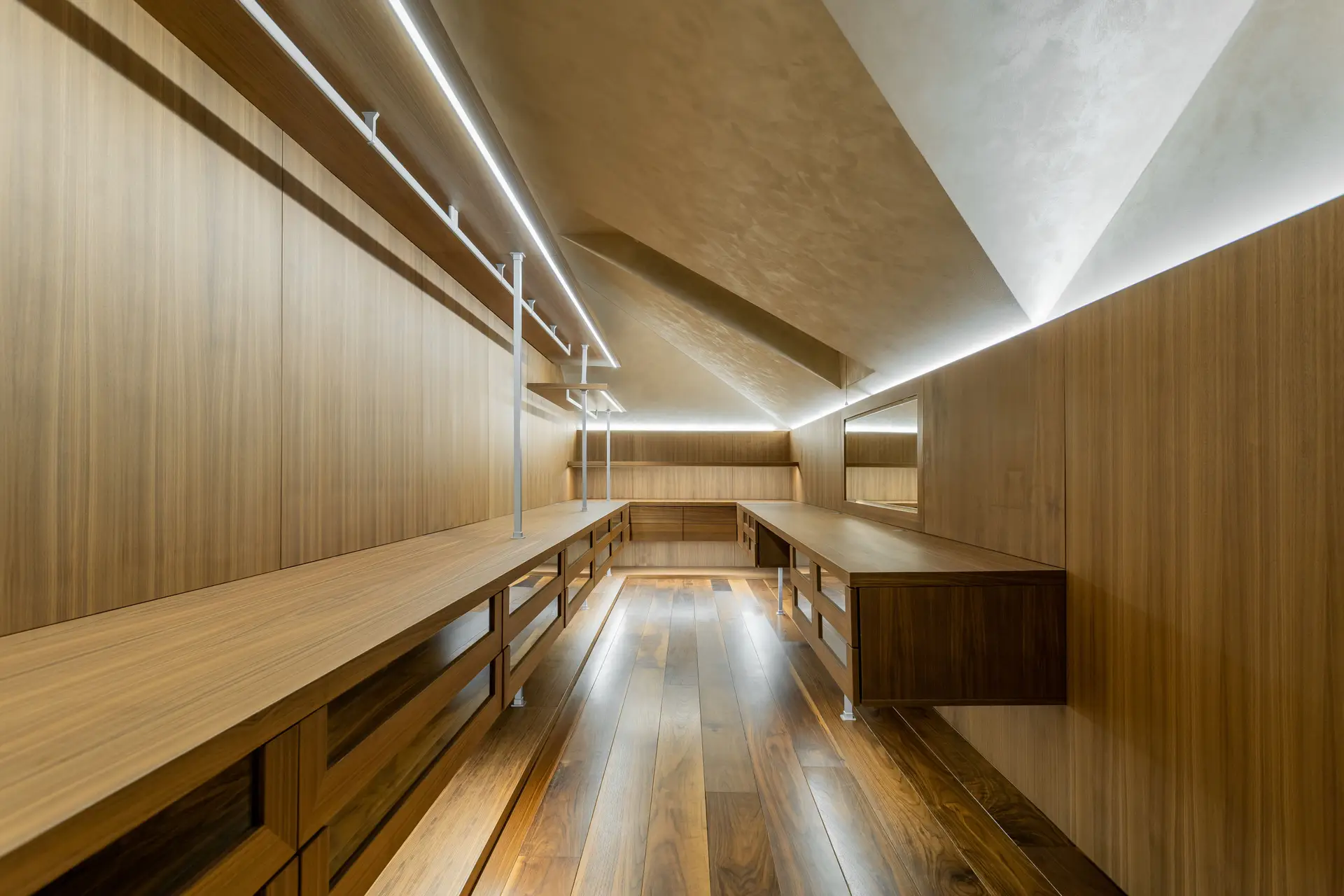 Considered architectural interior with bespoke warm timber joinery and ambient natural light