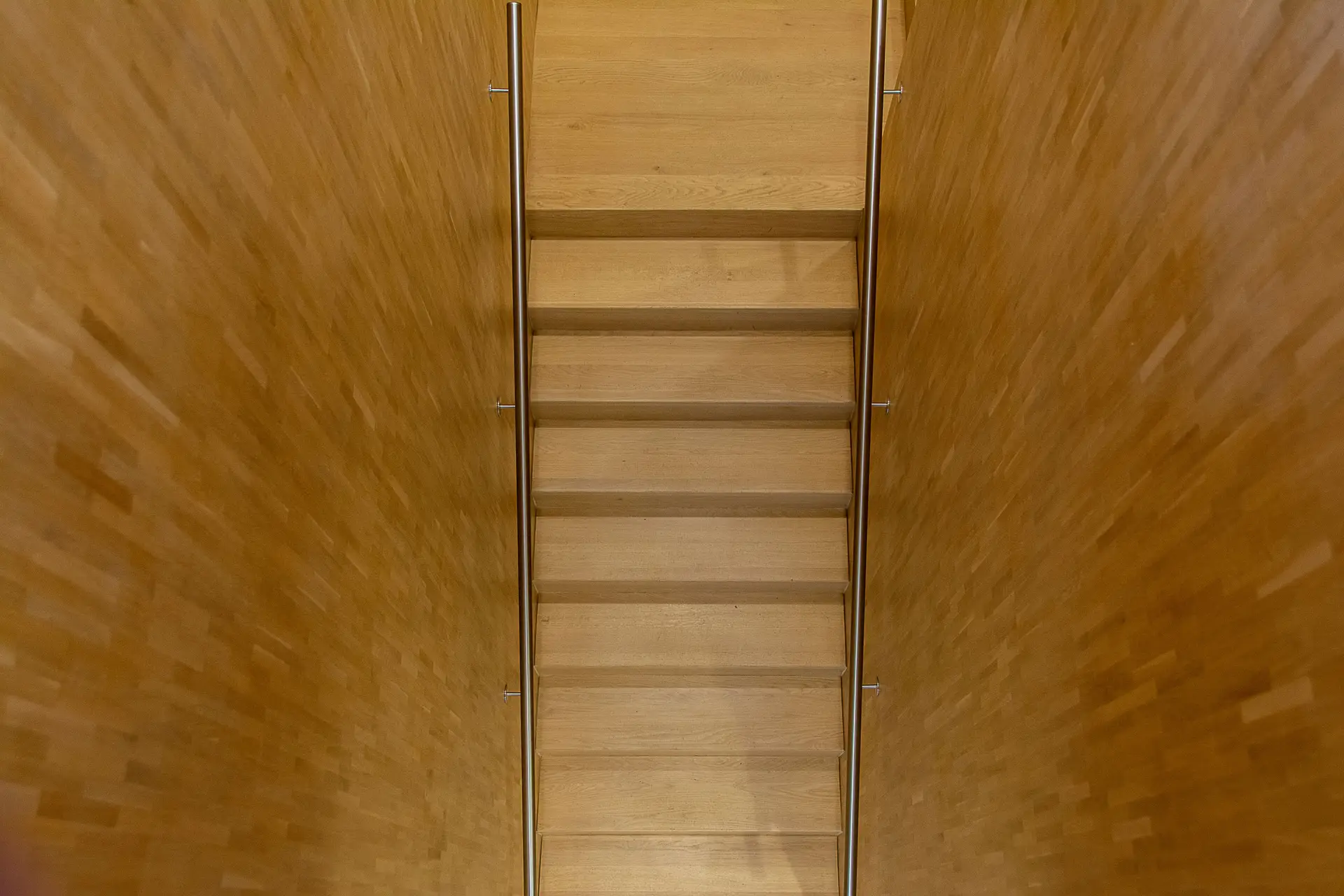 Minimalist staircase and integrated storage in contemporary Islington home