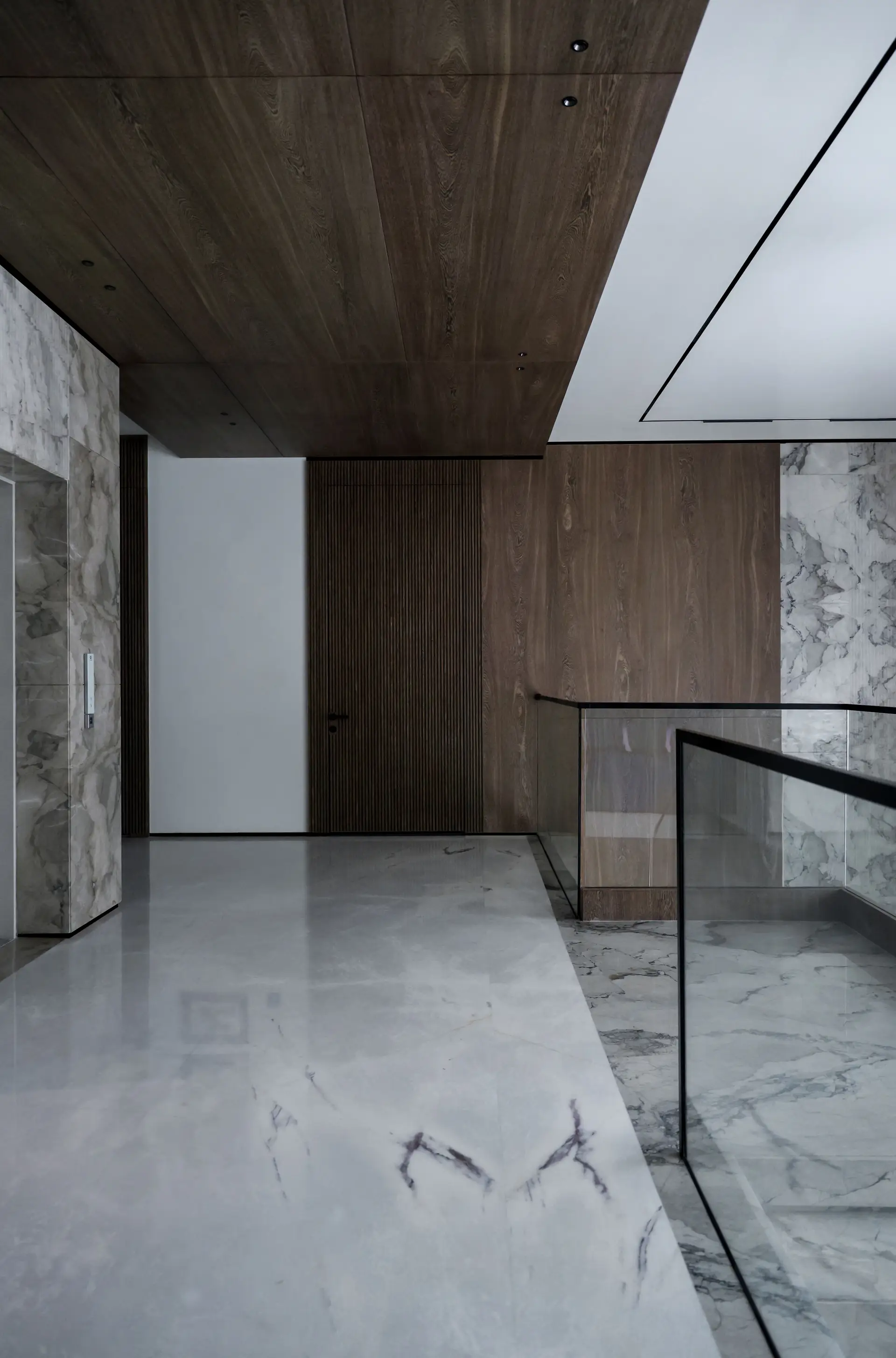 Interior architectural vignette with bespoke timber joinery and stone details
